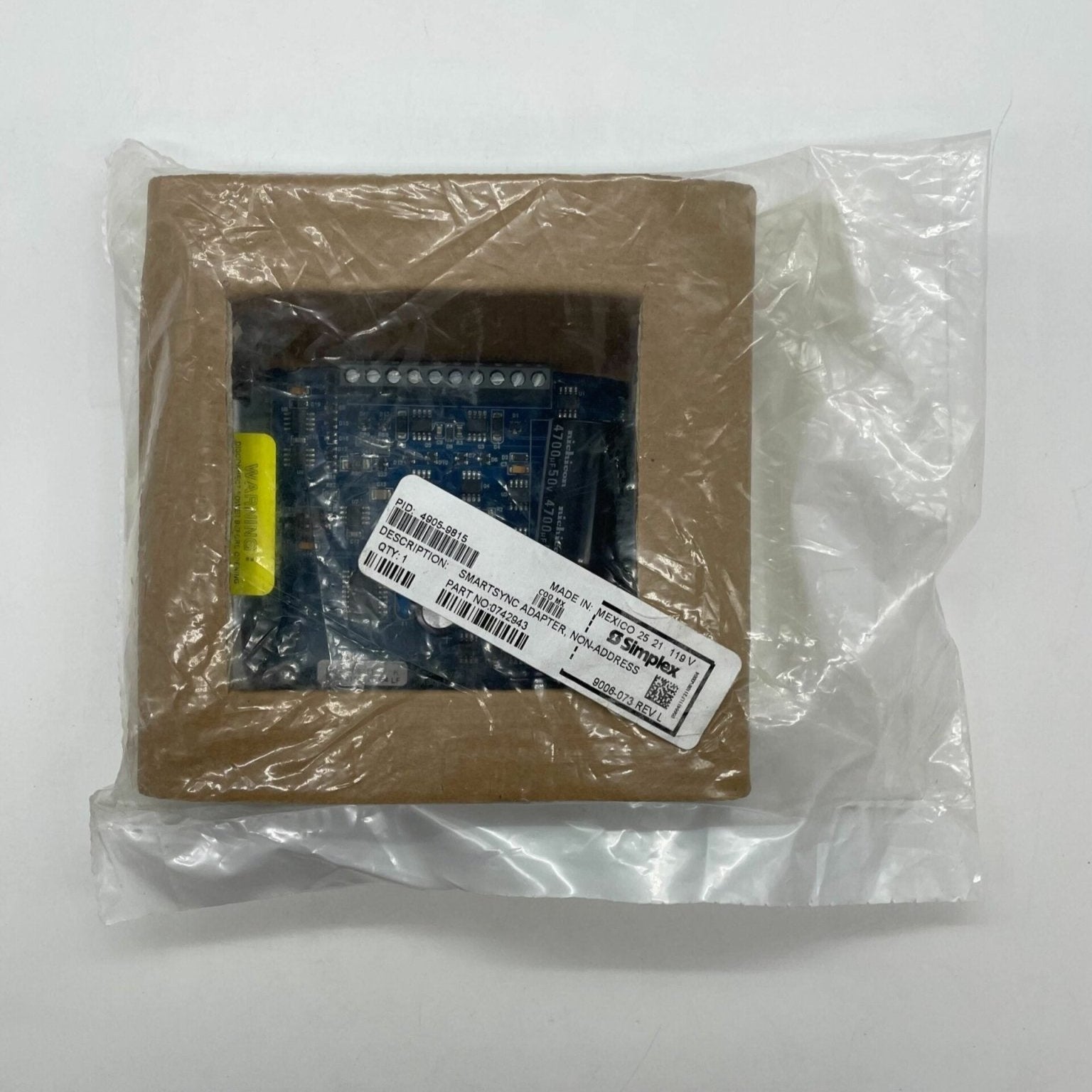 Simplex 4905-9815 fire alarm device by Simplex, showing the alarm unit with mounting hardware and safety labels.
