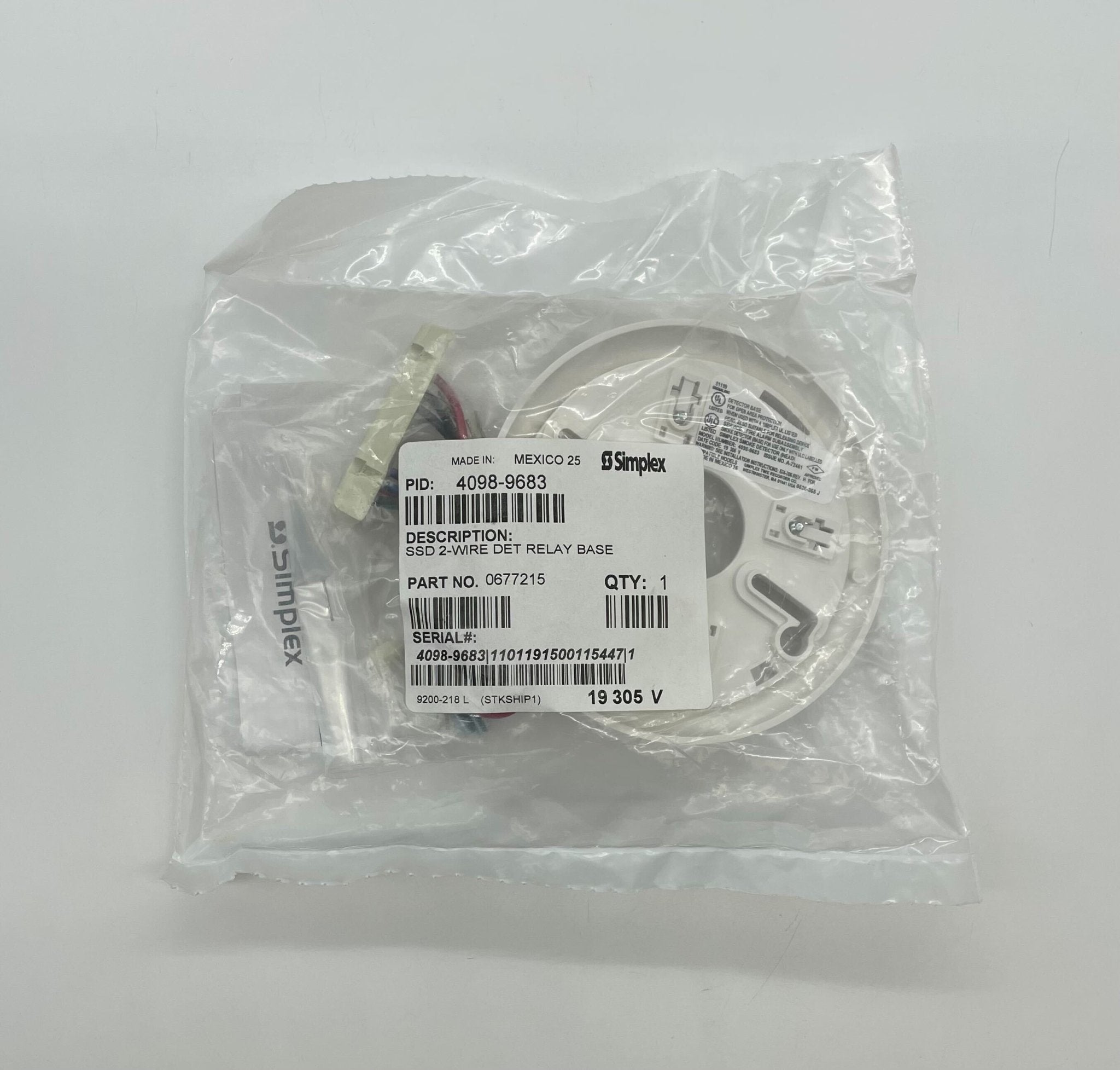 Simplex 4098-9683 fire alarm sensor with ULC certification, mounted on a ceiling for fire detection and safety.