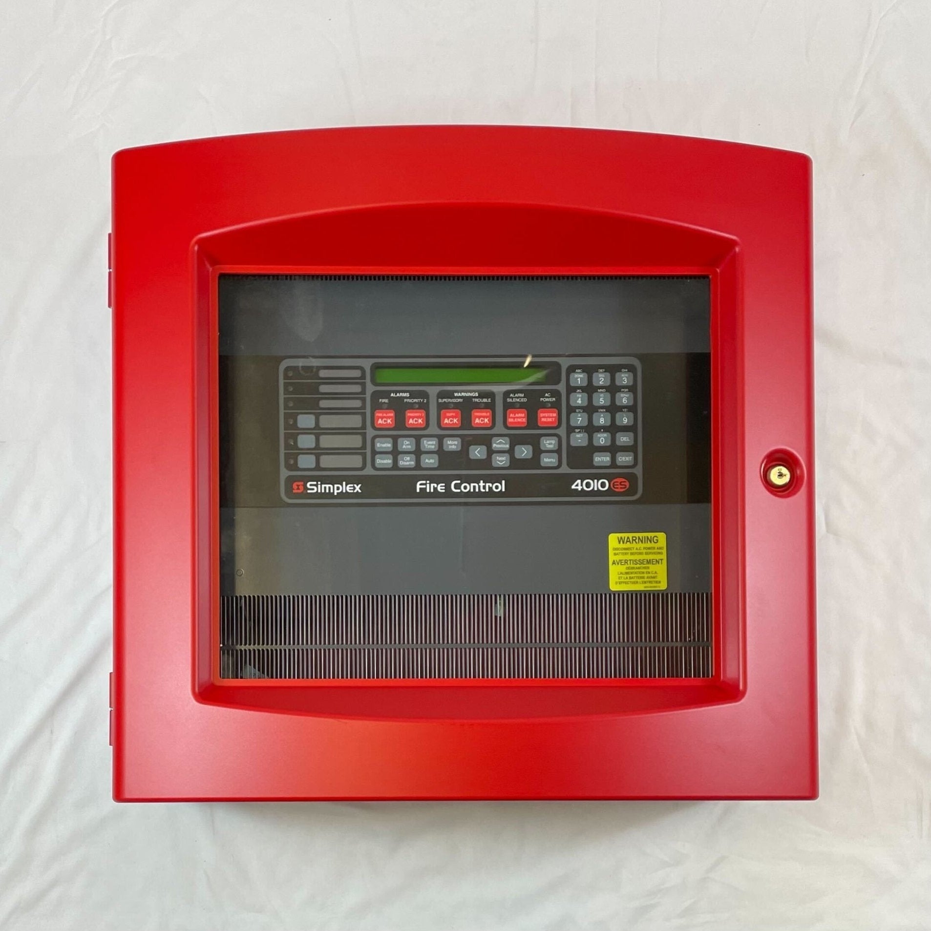 Simplex 4010-9401 fire alarm sensor with ULC certification mounted on a ceiling, part of Simplex fire safety system.