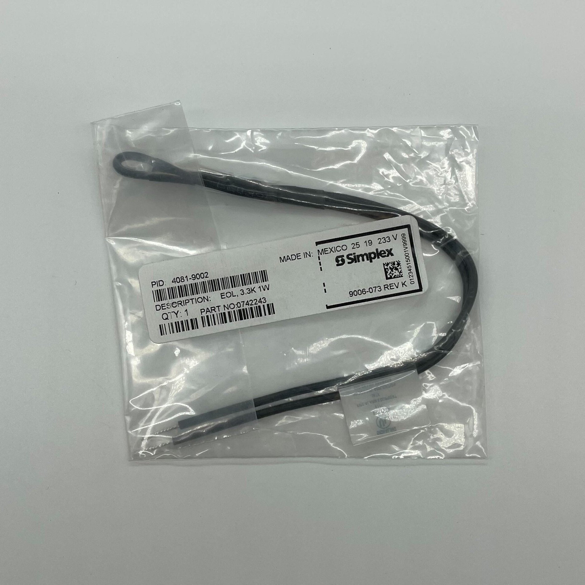 Simplex 4081-9002 EOL resistor featuring a compact design, with visible metal terminals and printed specifications.