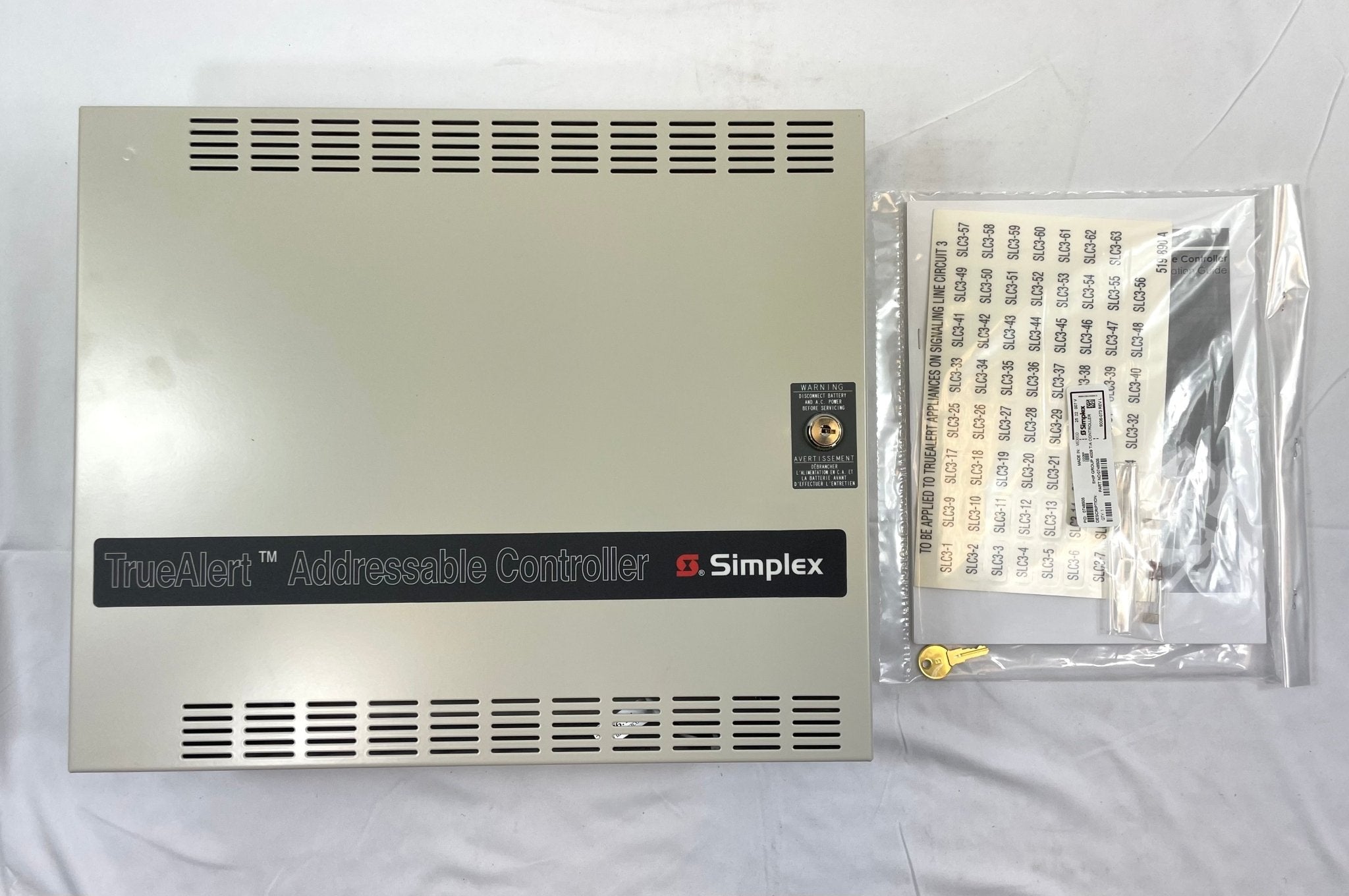 Simplex 4009-9401 fire alarm sensor, ULC-certified system sensor for fire detection, mounted on a ceiling.