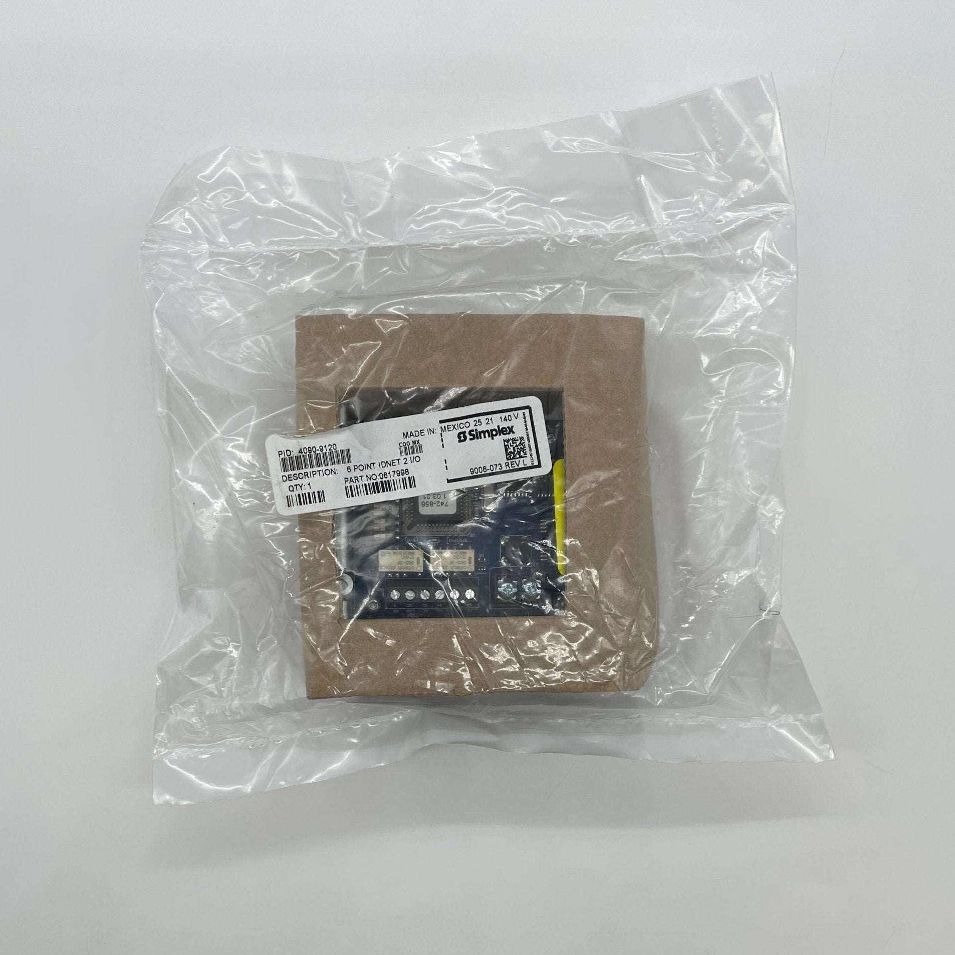 Simplex 4090-9120 fire alarm device with alarm indicator and wiring terminals, mounted on a wall.