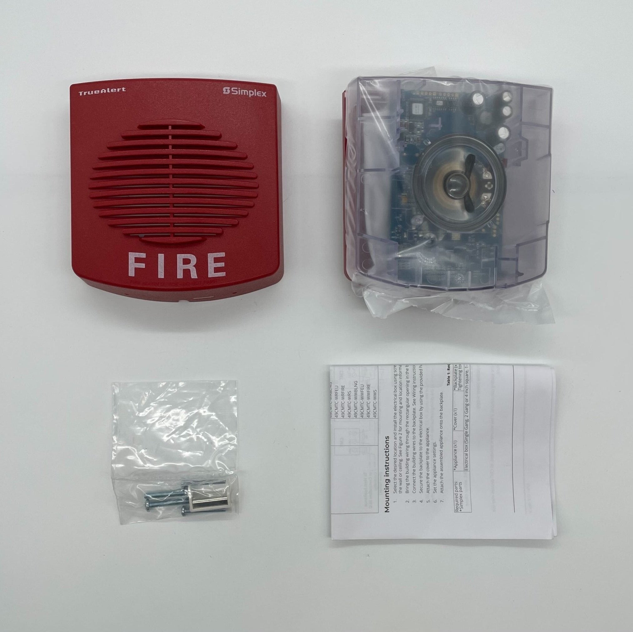 Simplex 49CMT-WRF fire alarm system with wireless communication, mounted on a wall in a building setting.