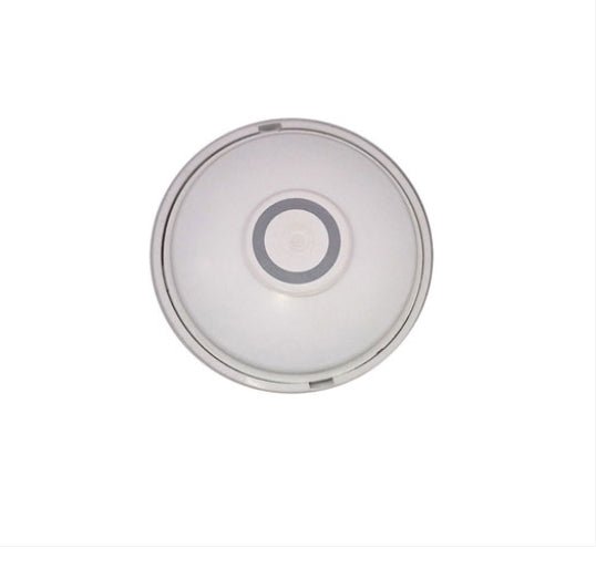 Simplex 2098-9494 fire alarm sensor with white plastic housing, mounted on a ceiling or wall for fire safety detection
