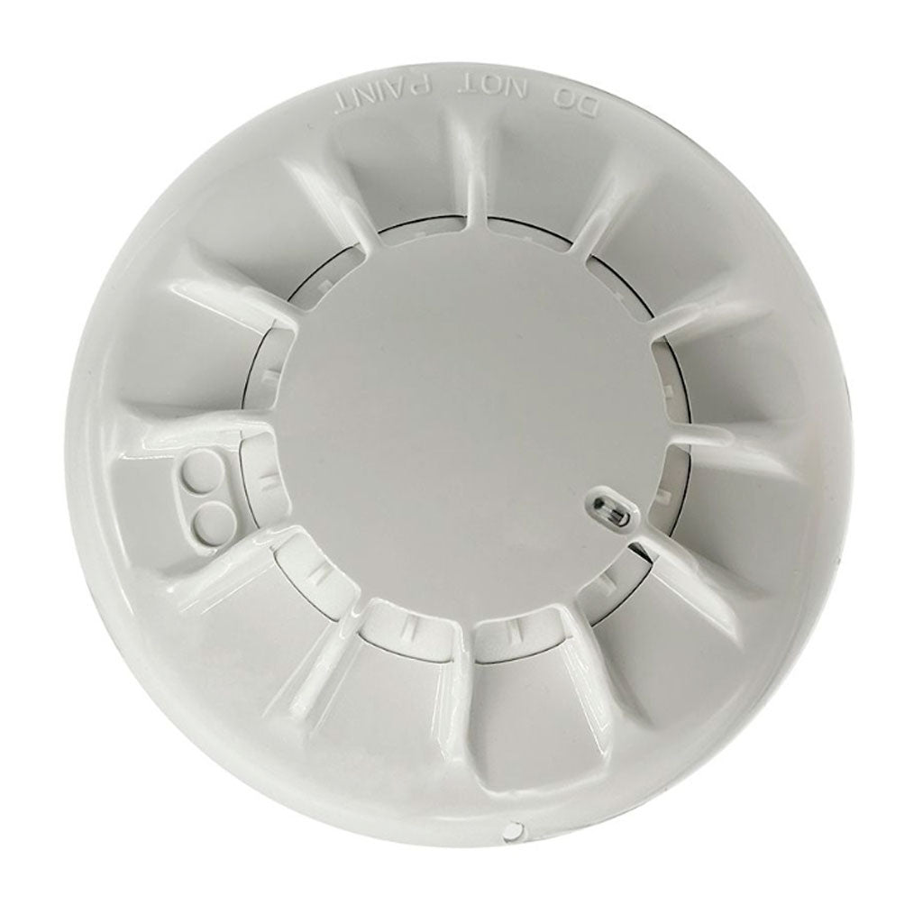 Simplex 4098-5610 heat detector installed on ceiling, part of Simplex fire safety system, with wiring and mounting hardware visible.