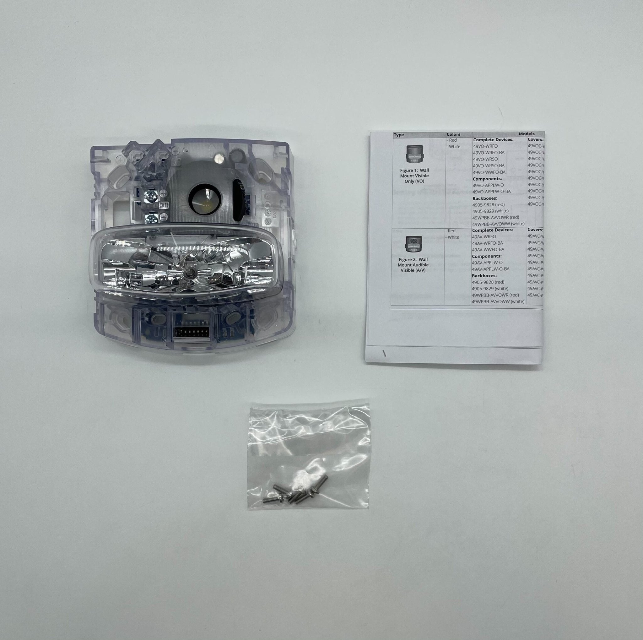 Simplex 49AV-APPLW-O fire alarm sensor with ULC certification, part of Simplex fire alarm system, mounted on wall.