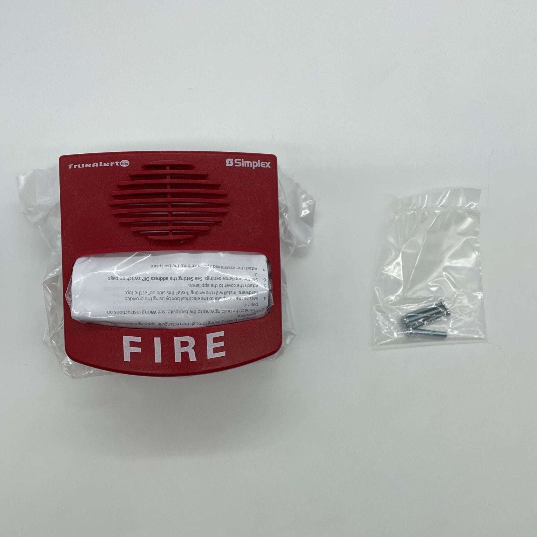 Simplex 49MTV-WRF fire alarm device installed, showing its compact design and user interface for fire safety monitoring.