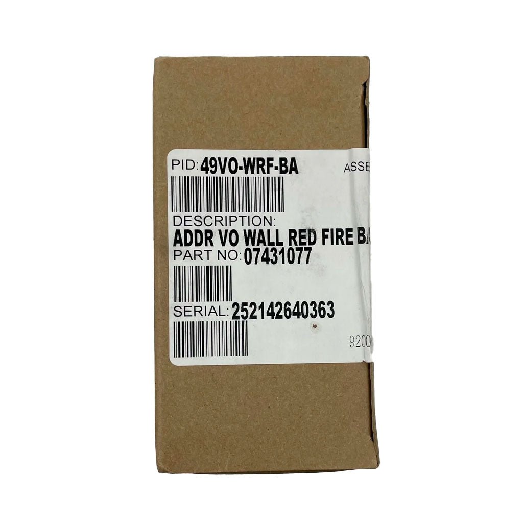 Simplex 49VO-WRF-BA strobe light with white flash, mounted on a ceiling in a commercial setting, designed for emergency signaling.