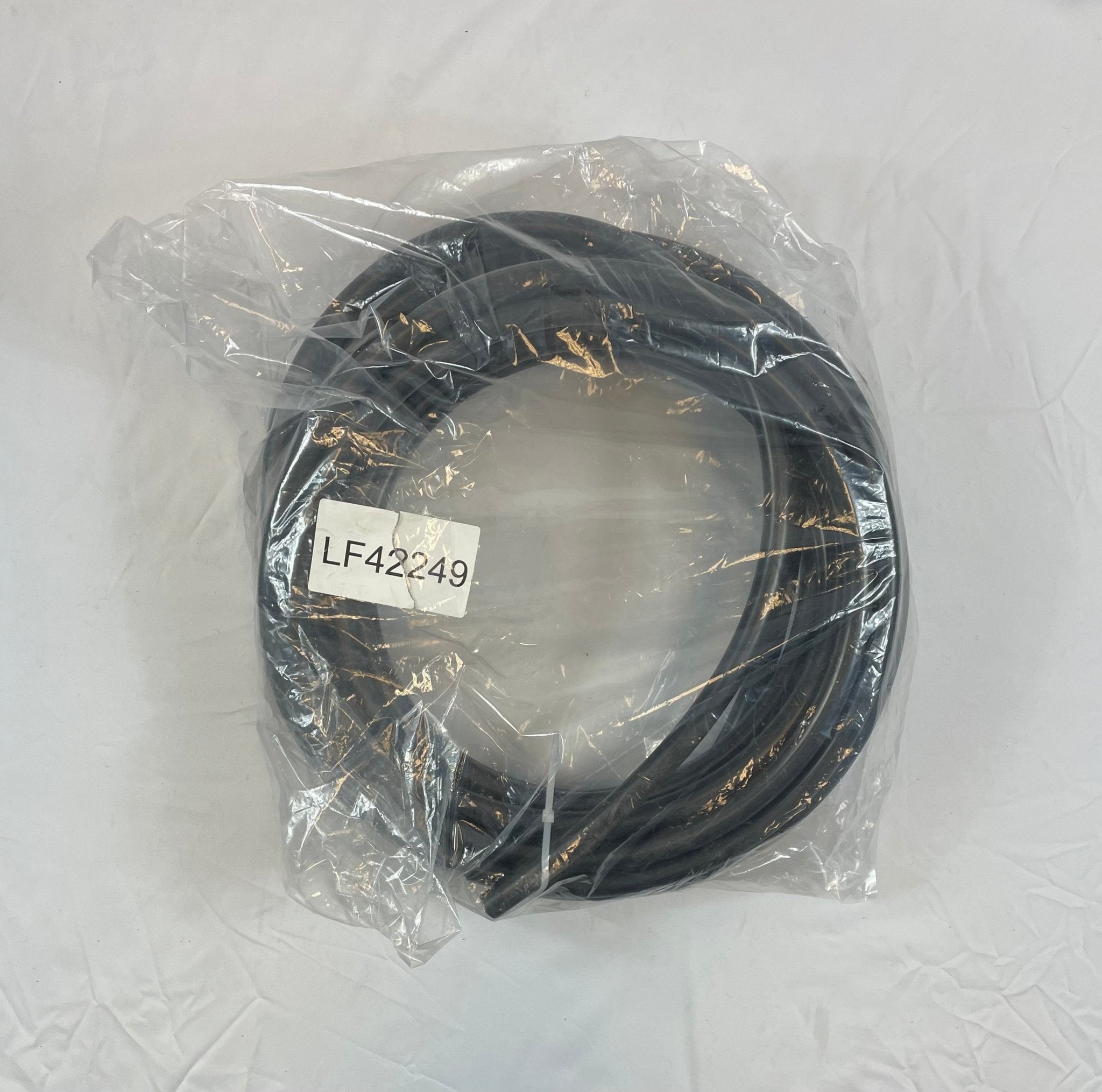 Simplex LF-42249 fire alarm with digital display and alarm test button, mounted on wall for building safety.