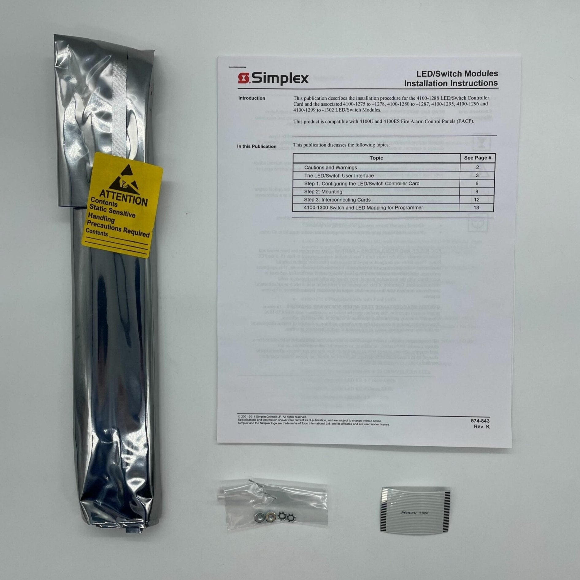 Simplex 4100-1280 fire alarm system sensor by Simplex, shown in a close-up image of the device with wiring and labels.