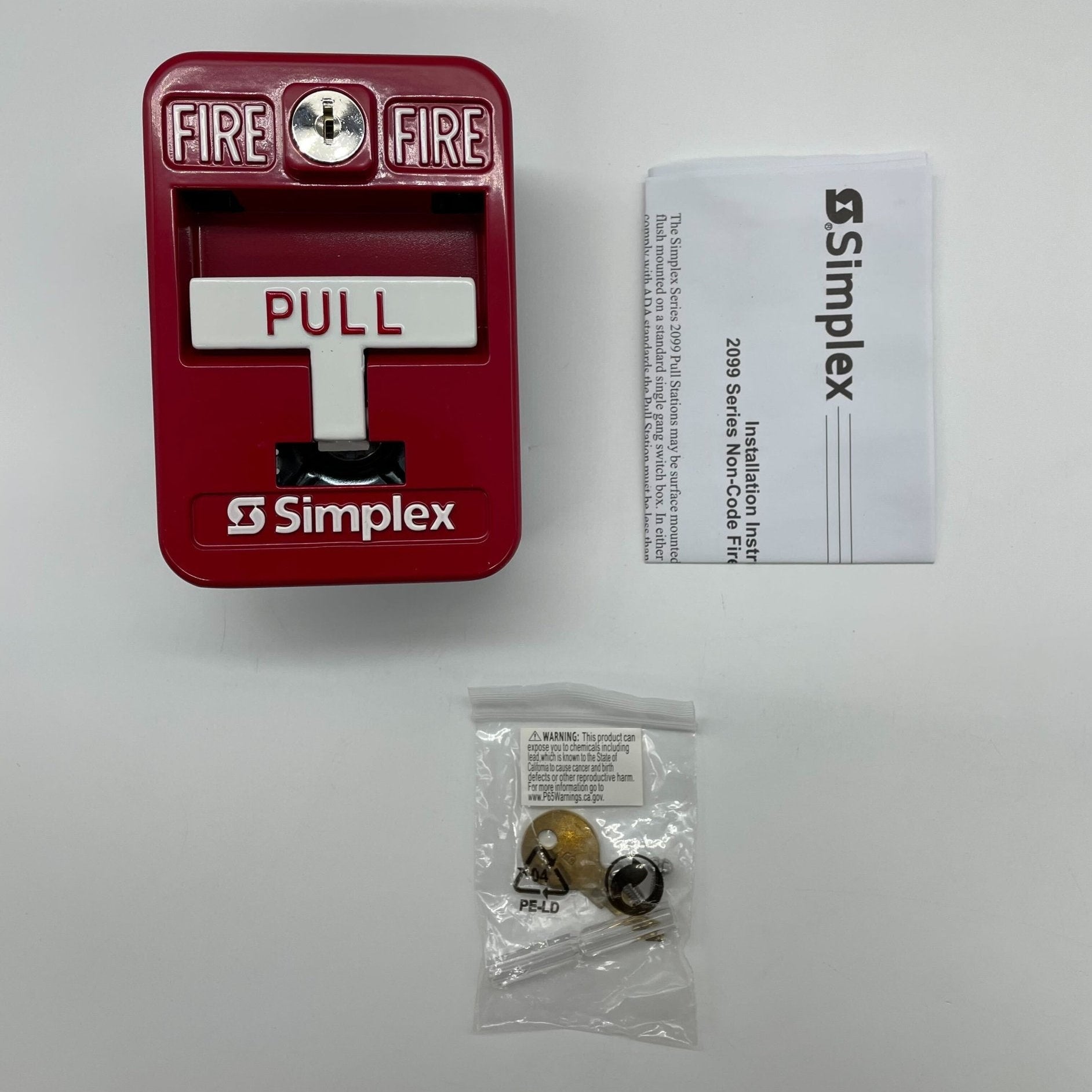 Simplex 2099-9138 pull station alarm system mounted on wall, part of Simplex fire safety equipment.