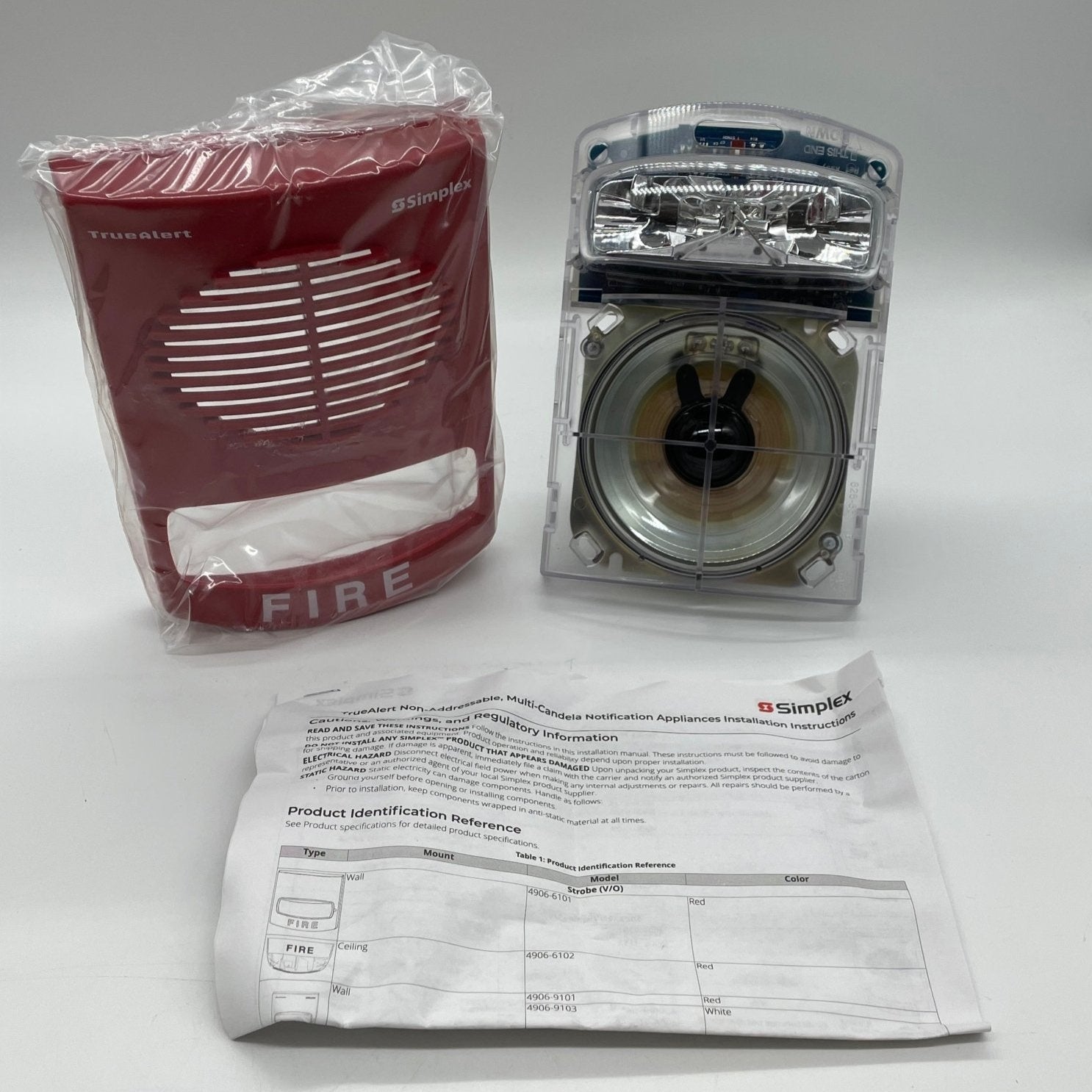Simplex 4903-9358 speaker strobe alarm with red cover and mounting base, designed for fire safety and emergency notification systems.