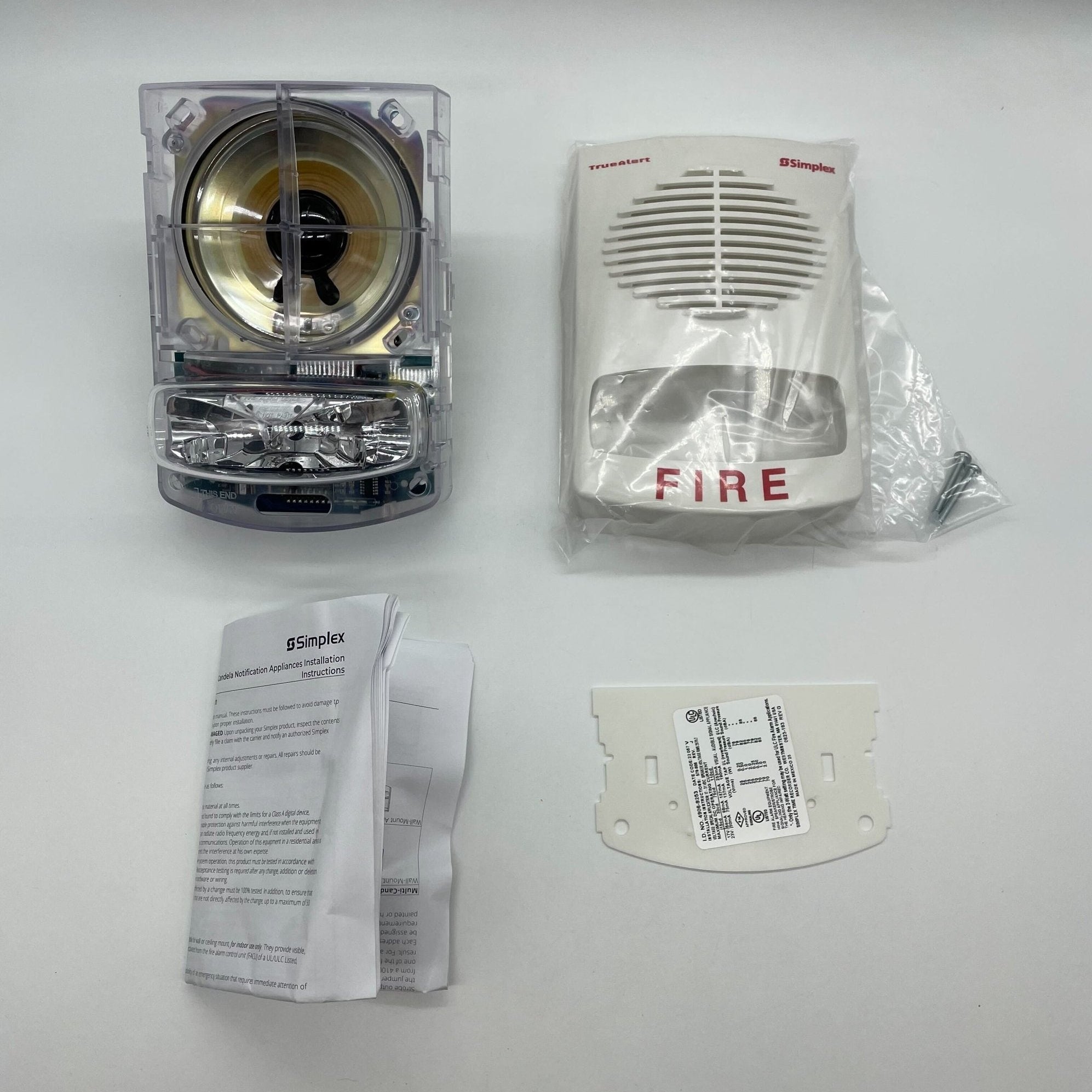 Simplex 4906-9253 speaker strobe with clear lens and mounting hardware, designed for visual alarm signaling.
