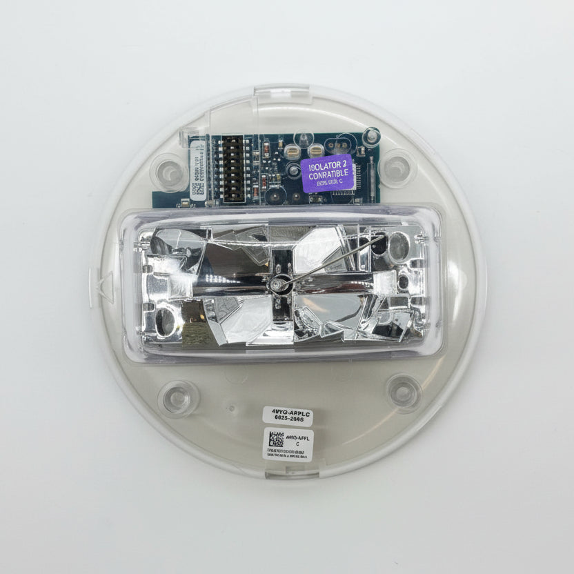 Simplex 49VO-APPLC strobe light, mounted on a wall, with clear lens and wiring visible, designed for emergency signaling.
