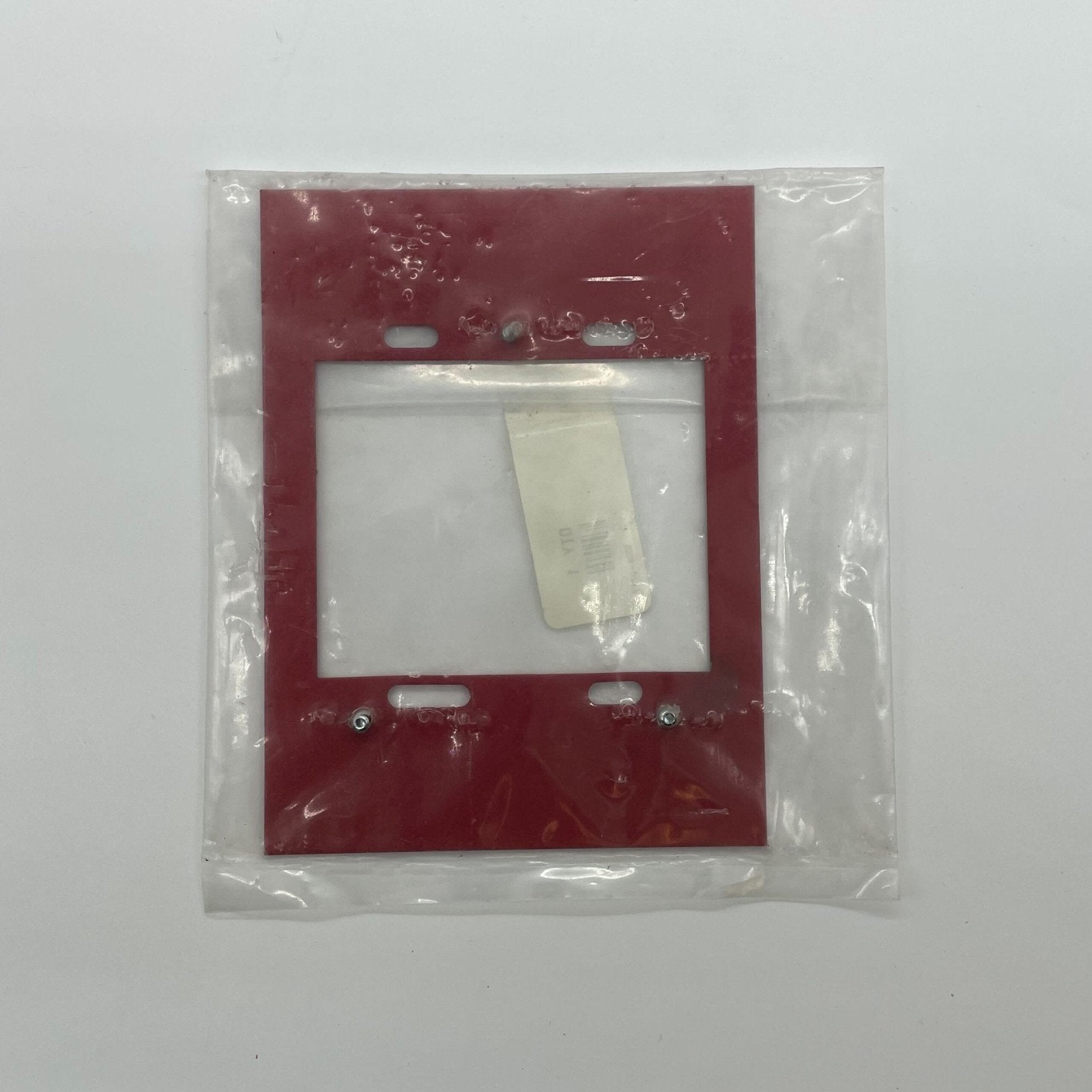 Simplex 2099-9813 pull station emergency alarm device mounted on wall for fire safety.