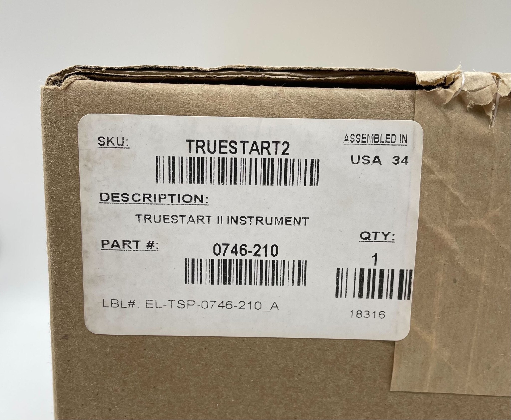 Simplex TRUESTART2 fire alarm testing instrument with digital display and testing probes, used for fire alarm system analysis.