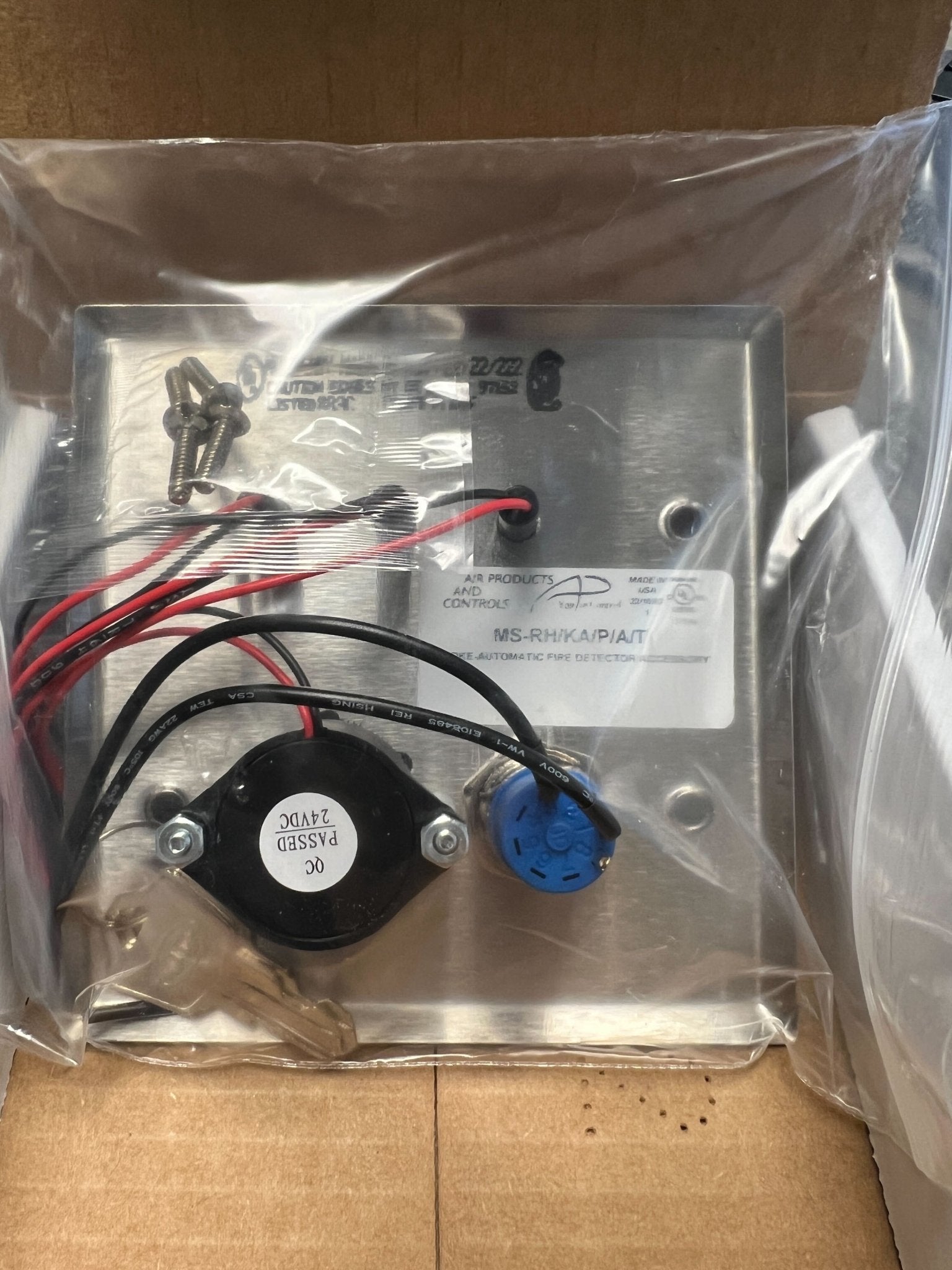 Space Age SSU-RH/KA/P/A/T fire alarm sensor with wiring and control panel components, designed for safety and fire detection.