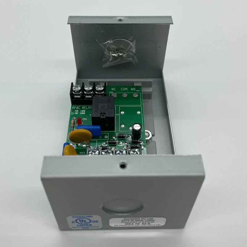Space Age SSU-MR-101/C/R industrial sensor with compact design, featuring metallic components and connection ports.