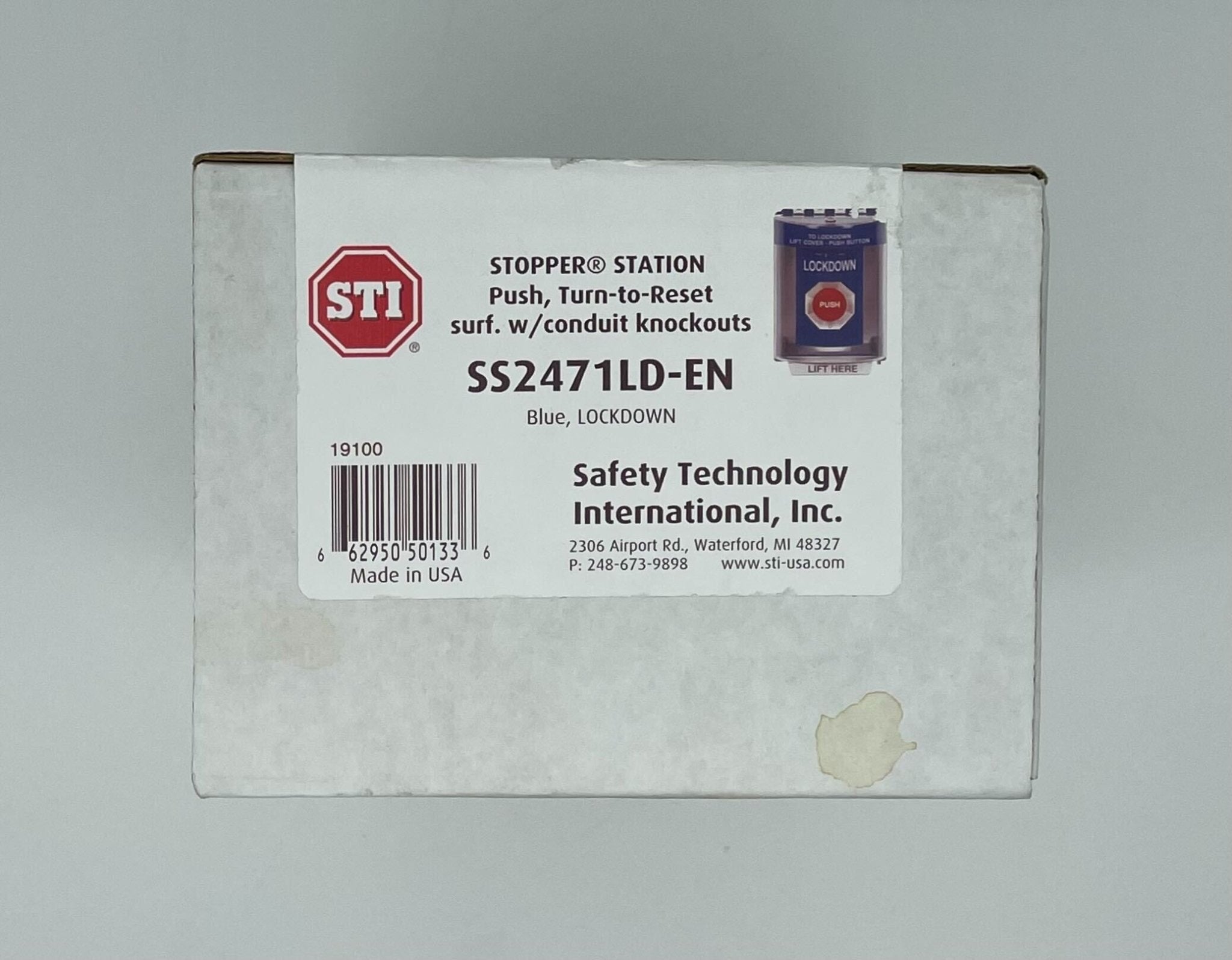 STI SS2471LD-EN indoor/outdoor surface turn-to-reset stopper station with emergency stop button and control panel.