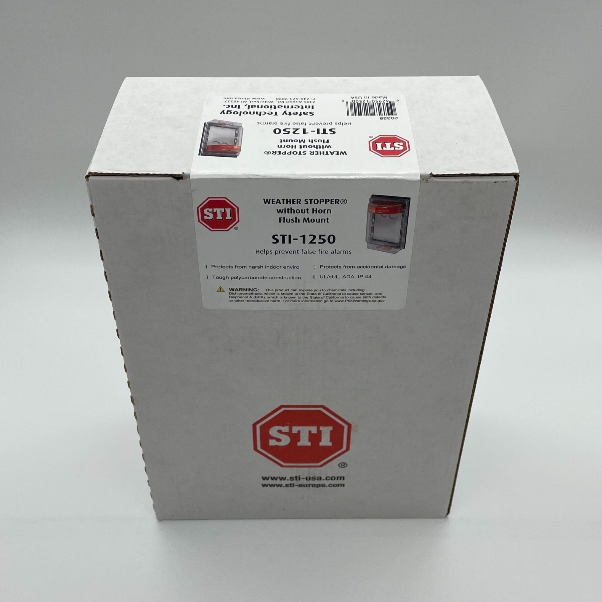 STI-1250 Weather Stopper fire alarm without horn, flush mount design, for outdoor safety and weather resistance.