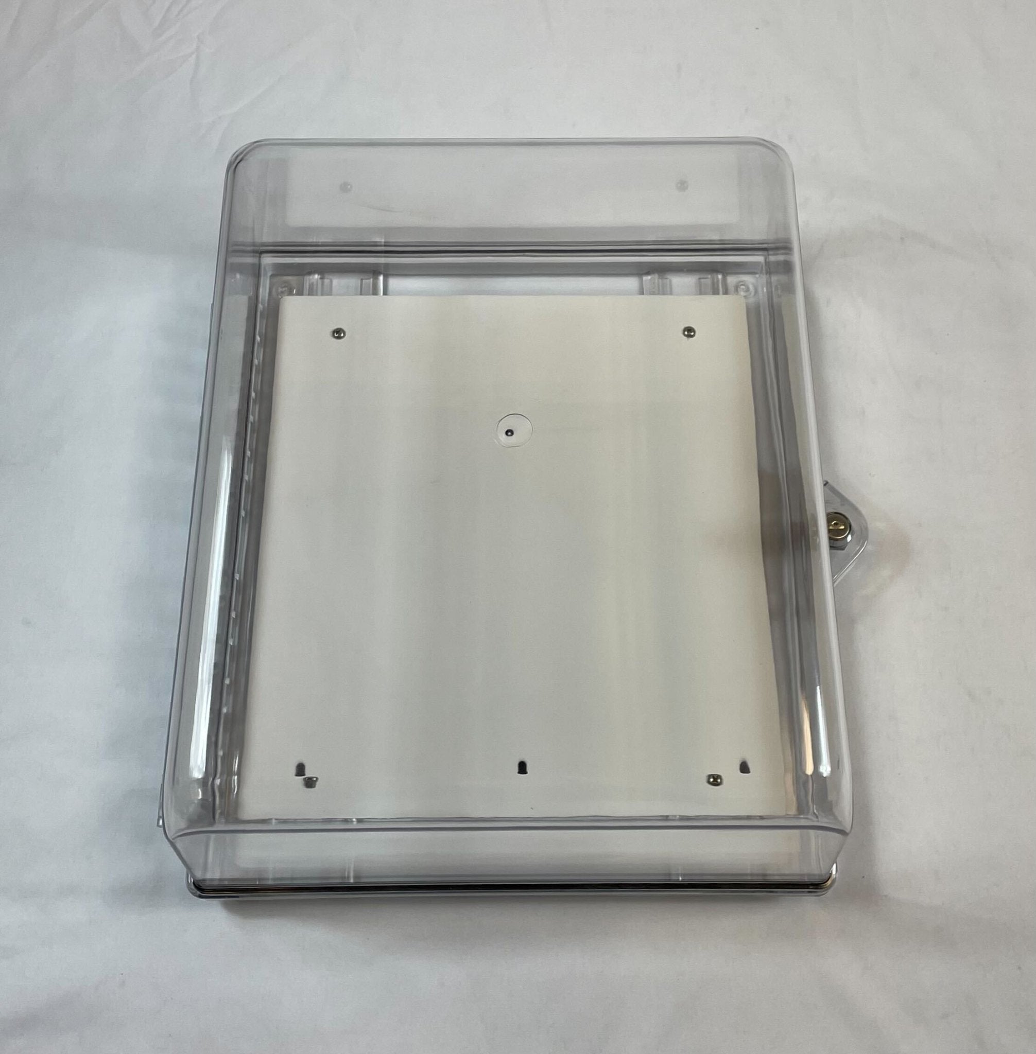 Polycarbonate protective cabinet with backplate and stopper from STI, designed for secure equipment storage.