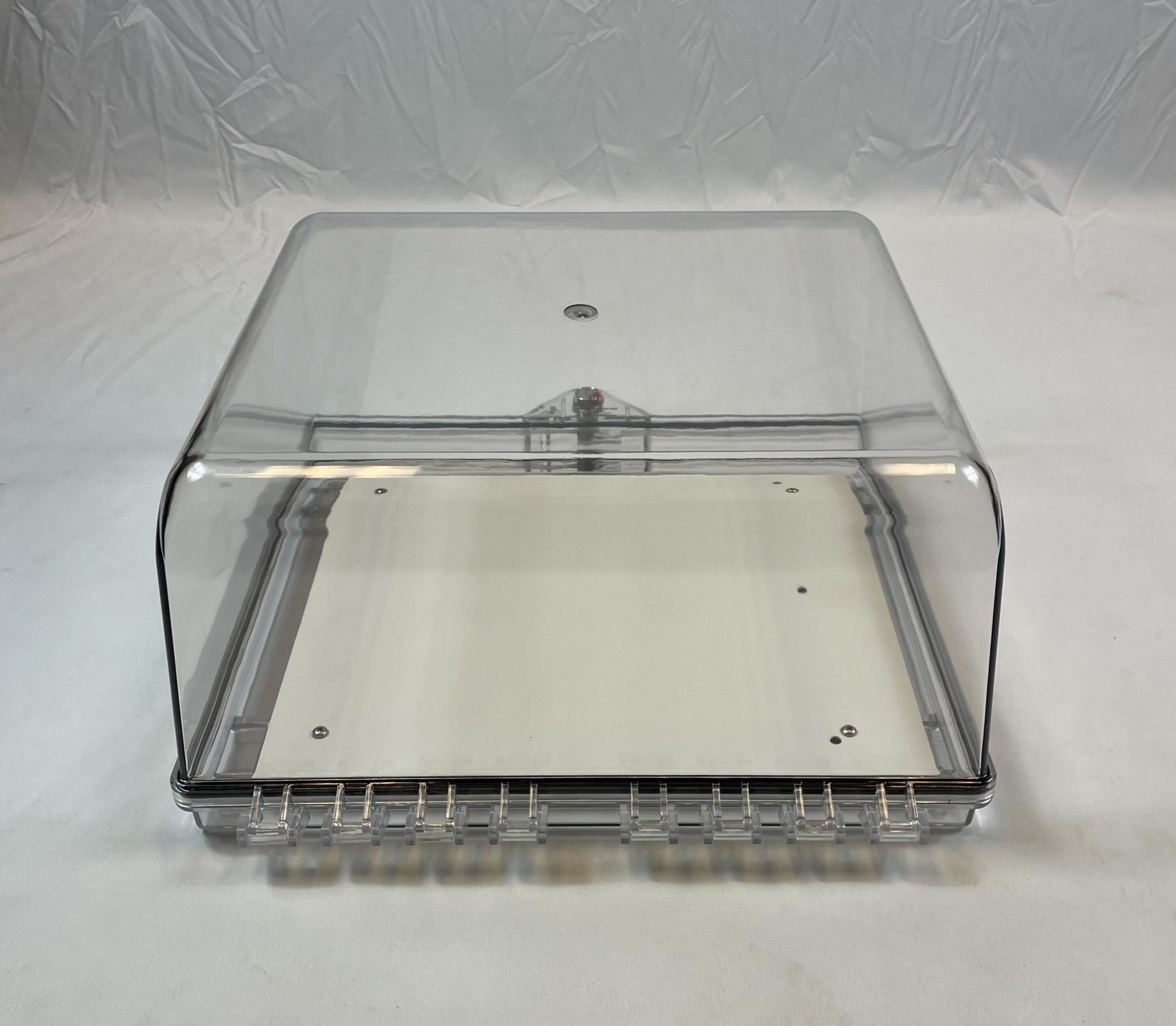 Polycarbonate protective cabinet with backplate and stoppers by STI, designed for secure storage and safety.