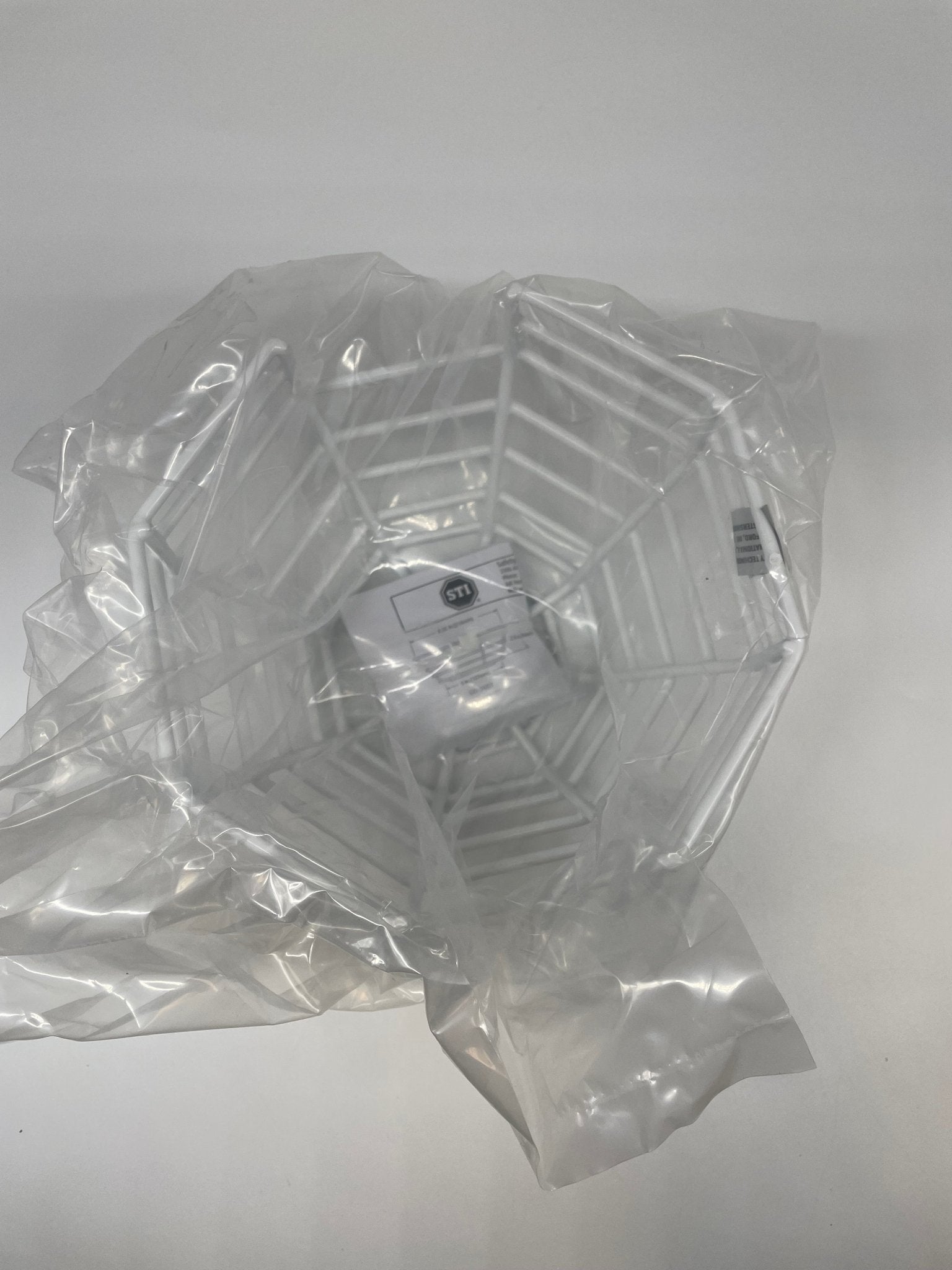 STI Safety Technology Steel Web Stopper, black metal safety stopper with web design, designed for secure safety barrier applications.