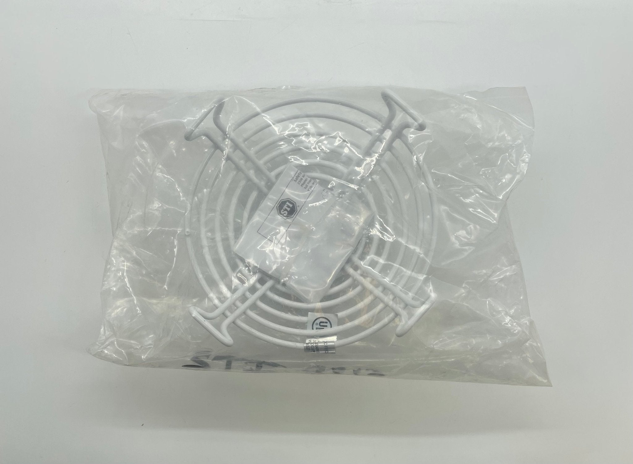 STI-9713 Steel Web Stopper cover for photoelectric smoke detector, durable metal shield for safety and protection.