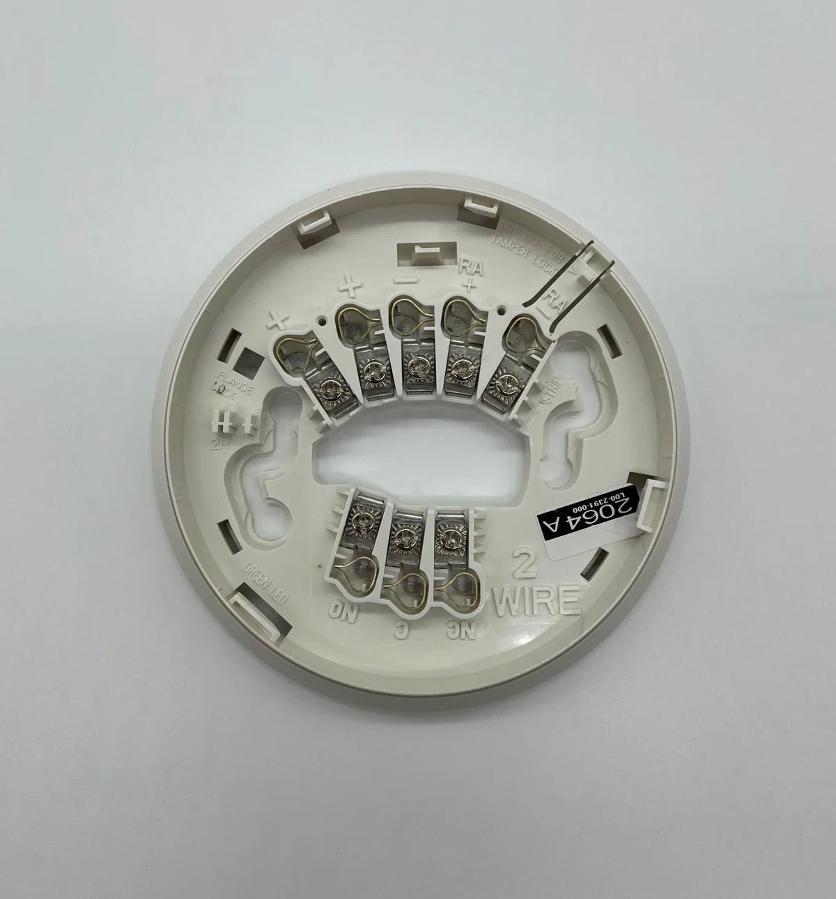System Sensor 2WTR-B fire alarm detector mounted on ceiling with wiring and mounting hardware visible.