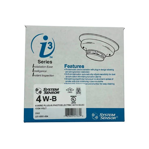 System Sensor 4W-B fire alarm smoke detector showing a white, rectangular sensor with mounting brackets for ceiling installation.