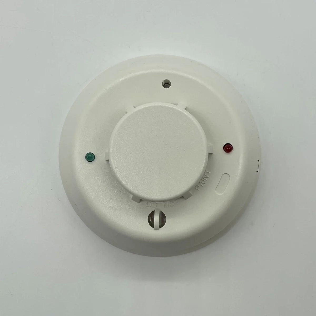 System Sensor 4WTA-B fire alarm transmitter with wall-mount design and wiring components, used for fire safety systems.