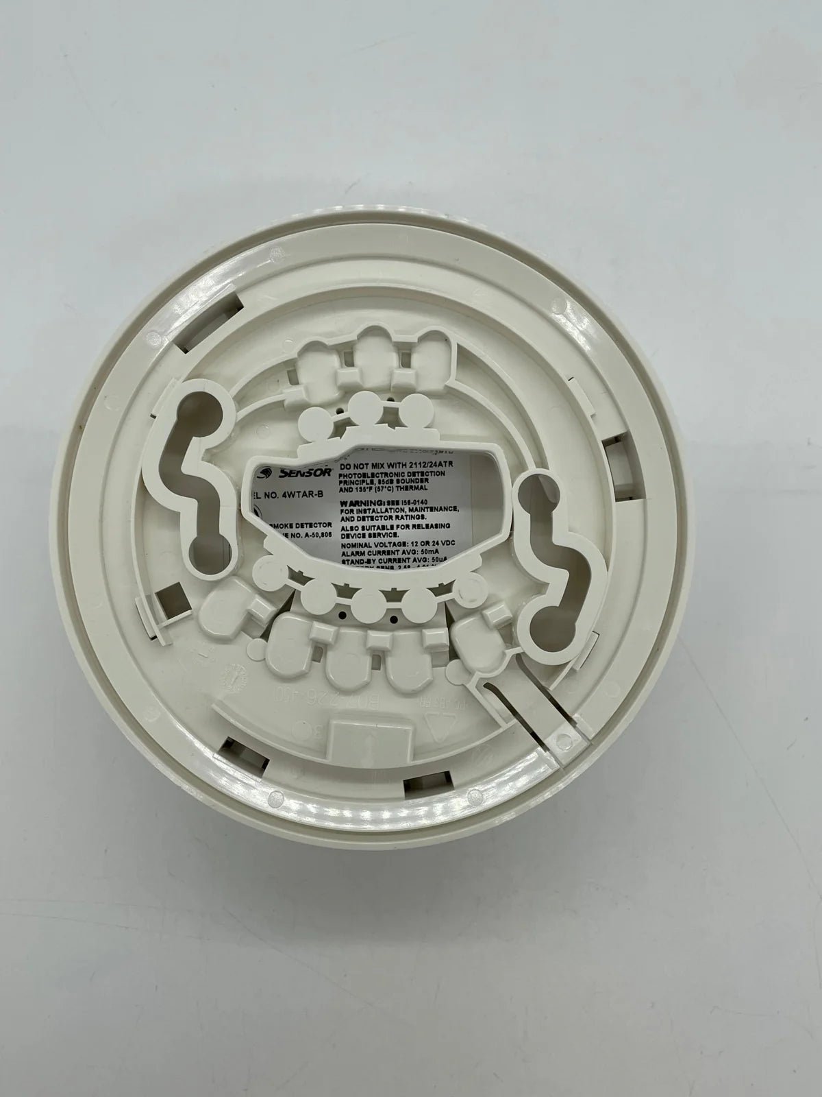System Sensor 4WTAR-B wireless temperature and humidity sensor in a compact design for environmental monitoring.