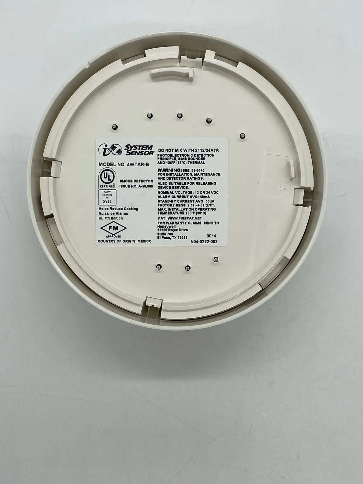 System Sensor 4WTAR-B fire alarm relay module, compact device with wiring terminals for smoke detector systems.