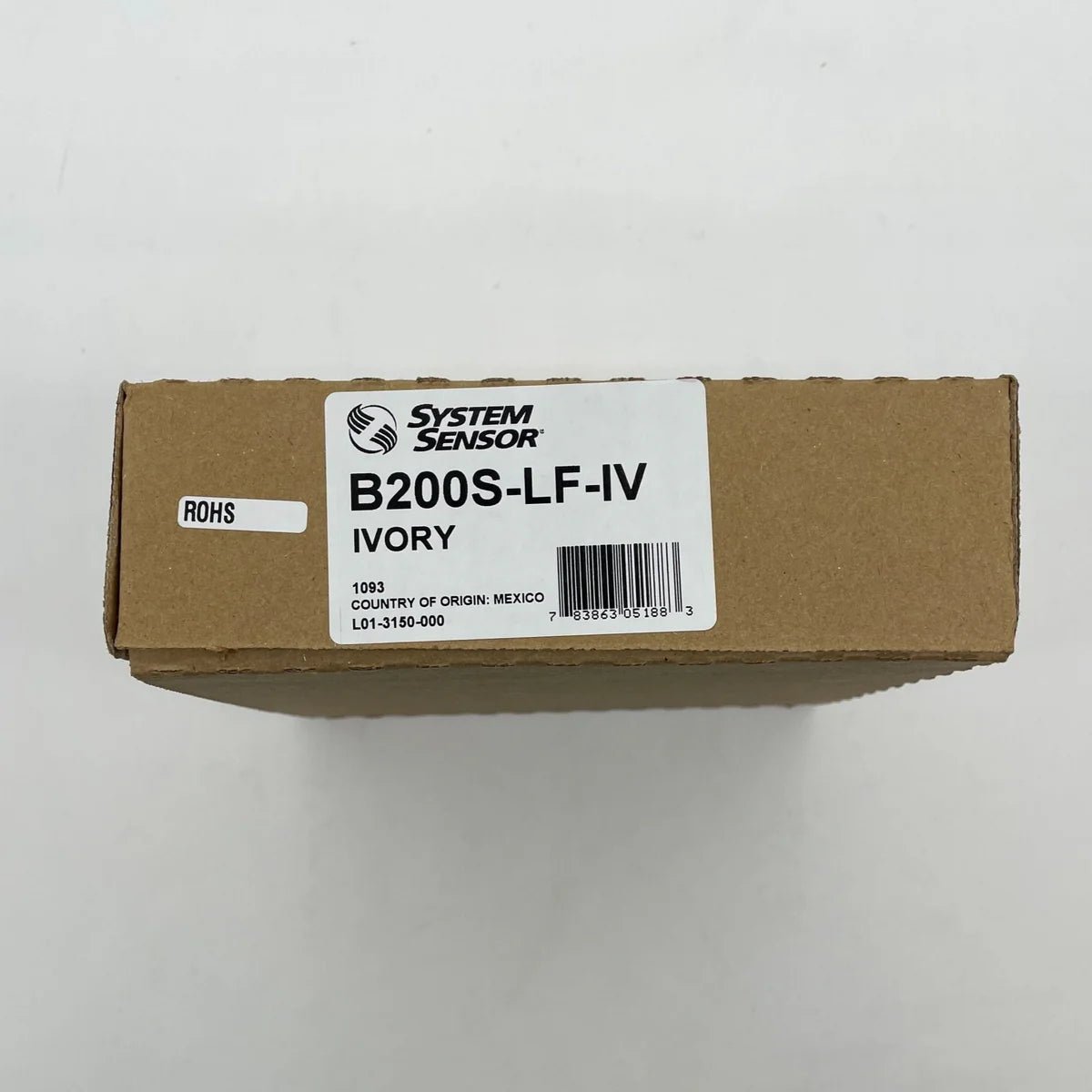System Sensor B200S-LF-IV fire alarm smoke detector mounted on ceiling with wiring visible.