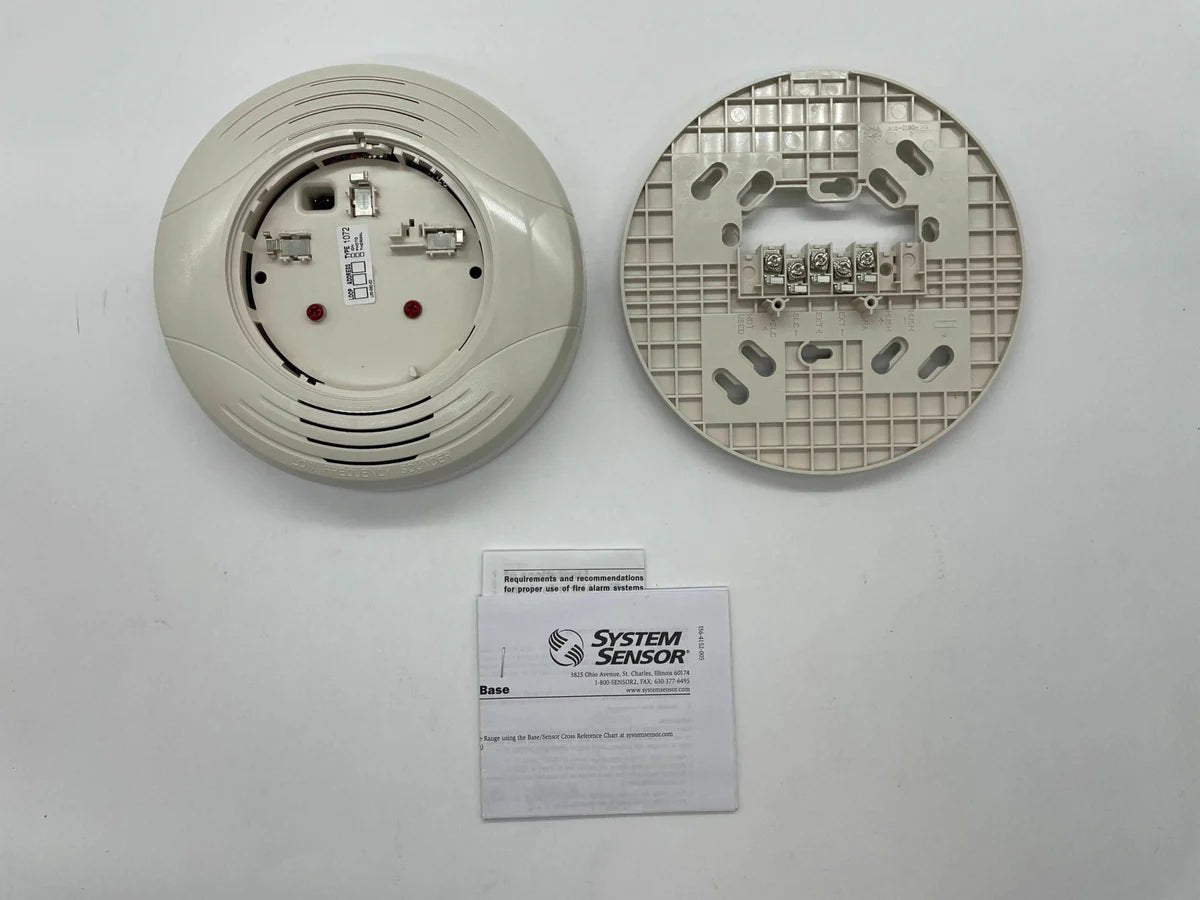 System Sensor B200SR-LF-IV fire alarm detector with addressable sensor and LED indicator, mounted on ceiling.