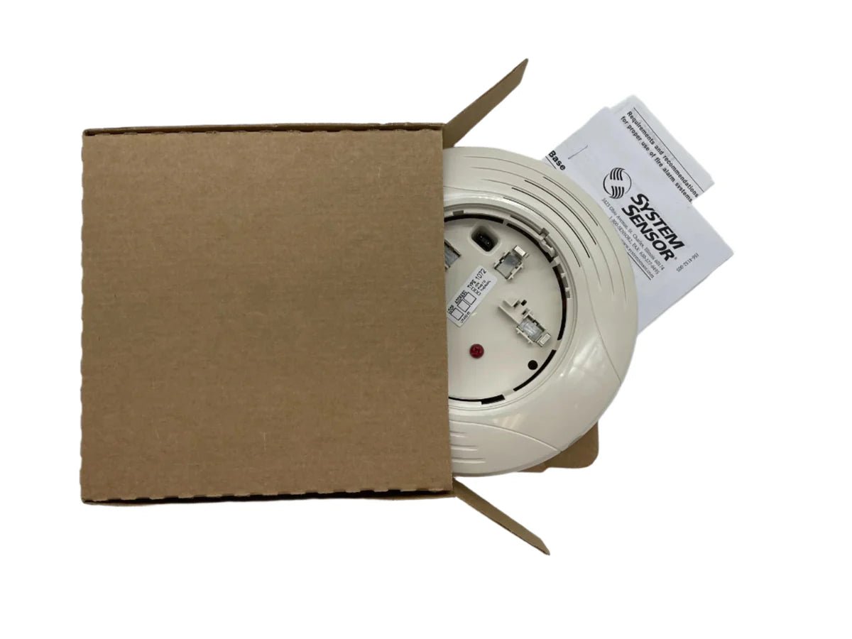 System Sensor B200SR-LF-IV fire alarm smoke detector mounted on ceiling in a building interior