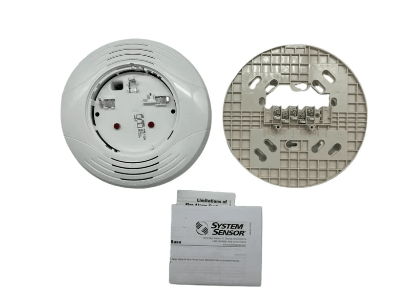 System Sensor B200SR-LF-WH smoke detector with white plastic casing and mounting base, designed for residential or commercial use.