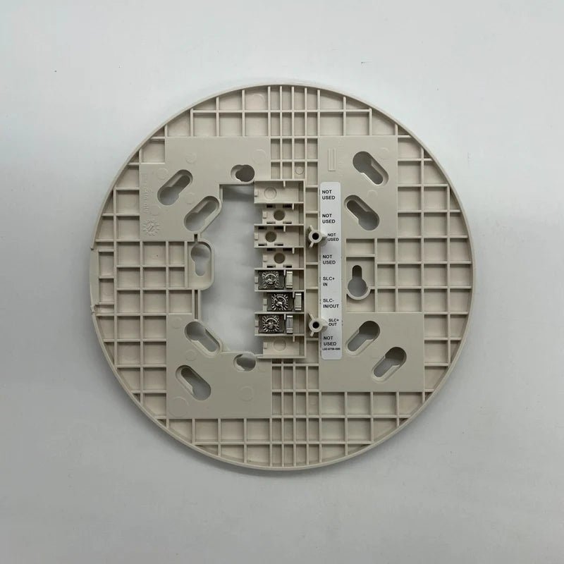 System Sensor B224BI-WH white dual-technology smoke detector with test and silence buttons, mounted on ceiling.