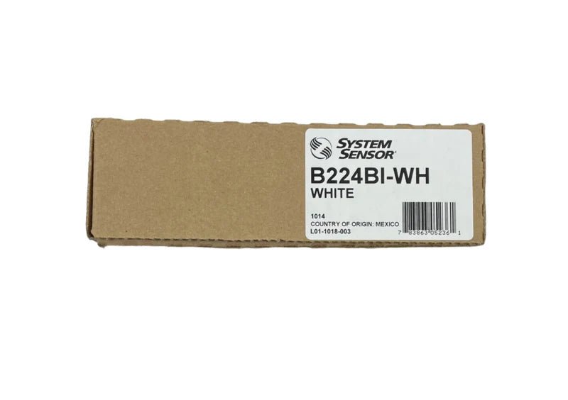 System Sensor B224BI-WH dual-ionization smoke detector mounted on ceiling in a home or office setting.