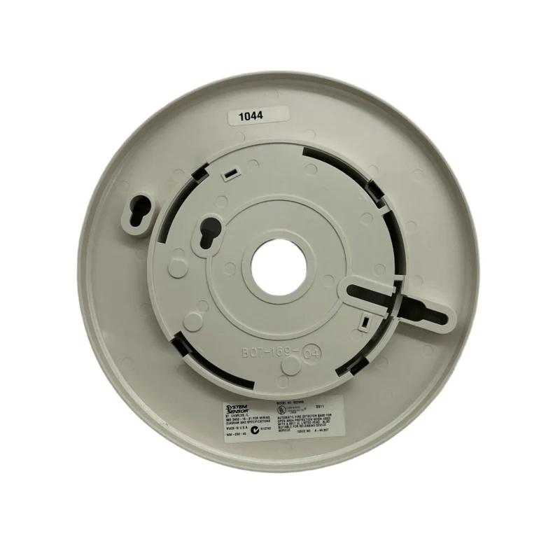 System Sensor B224RB smoke detector with red LED indicator and mounting base, designed for fire alarm systems.