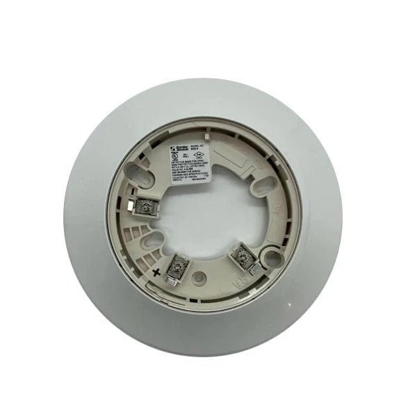 System Sensor B300-6 fire alarm detector with white plastic housing and mounting bracket on a neutral background
