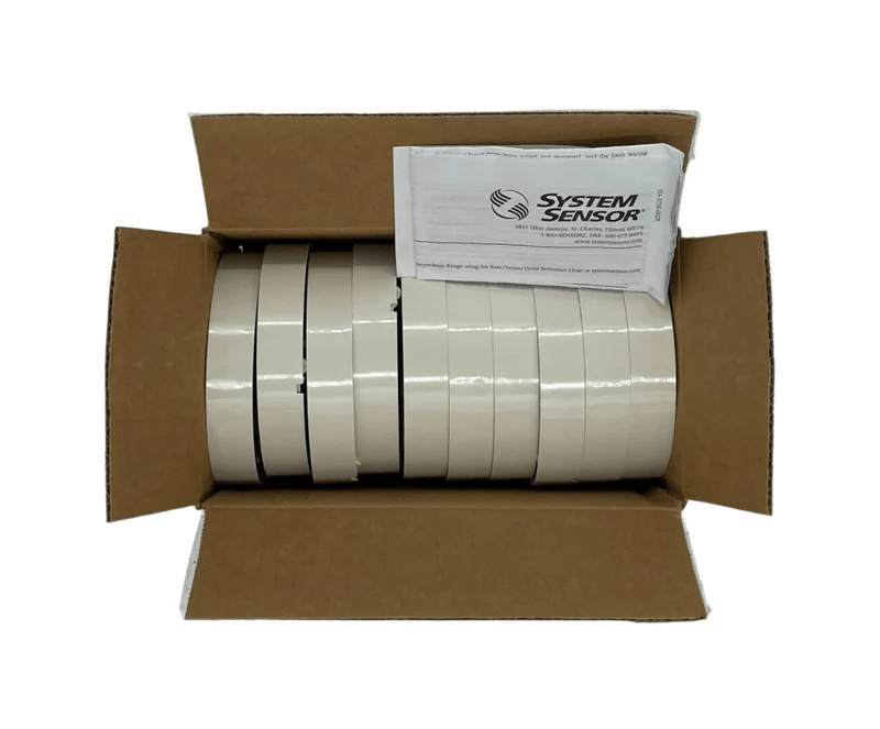 System Sensor B501BP fire alarm base with mounting hardware, designed for reliable connection in fire detection systems.