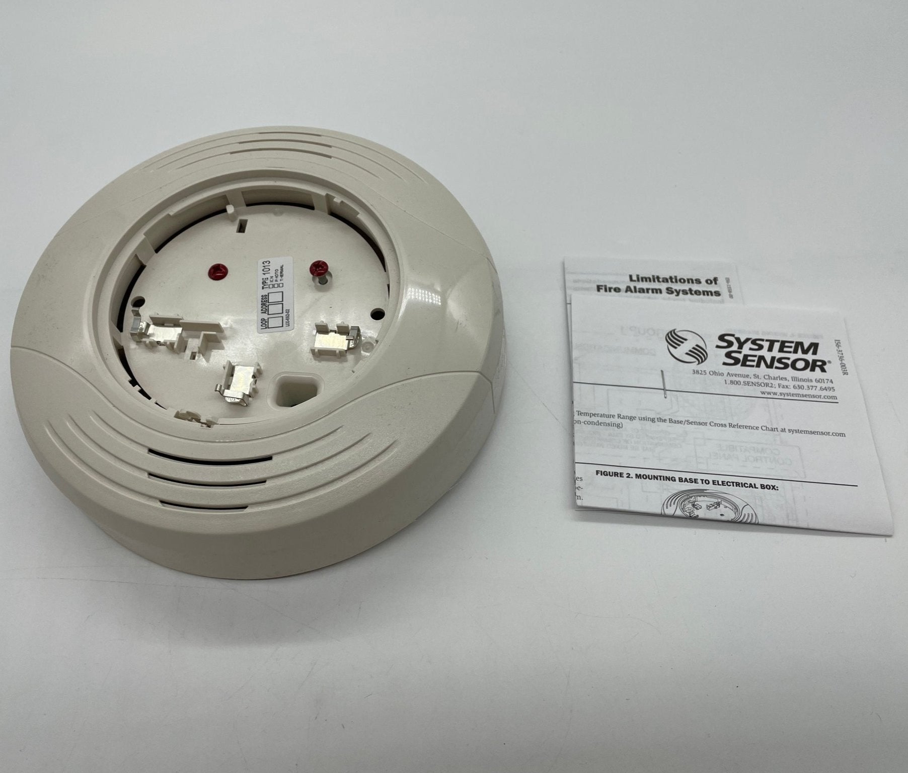 System Sensor B224BI dual-technology smoke and heat detector with alarm and mounting base, designed for fire safety systems.