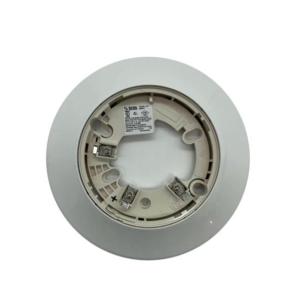 System Sensor B300-6 fire alarm detector with white plastic housing and mounting bracket on a neutral background