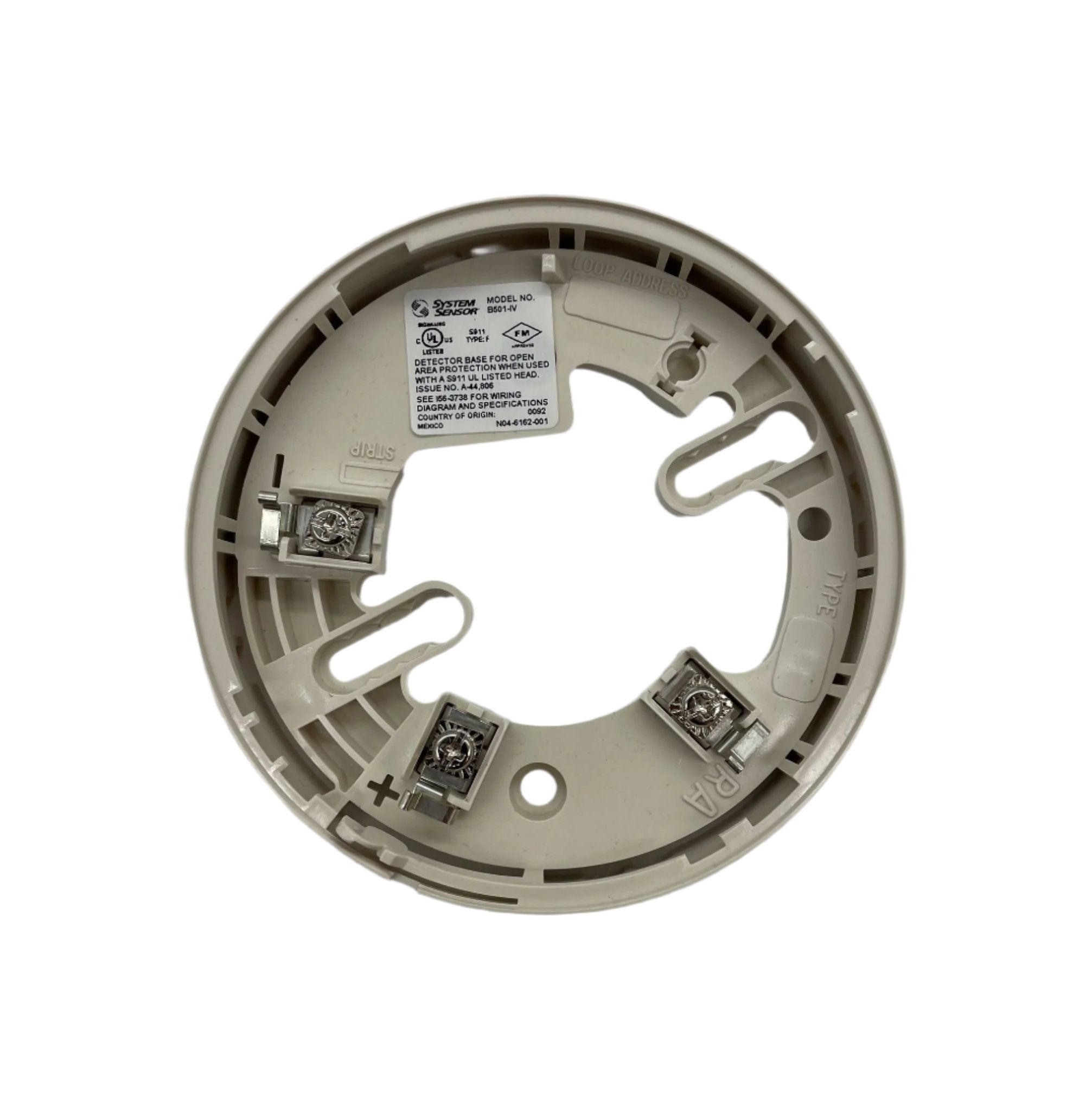 System Sensor ULC B501-IV fire alarm mounted on ceiling, showing its sensor and warning indicator for fire safety.