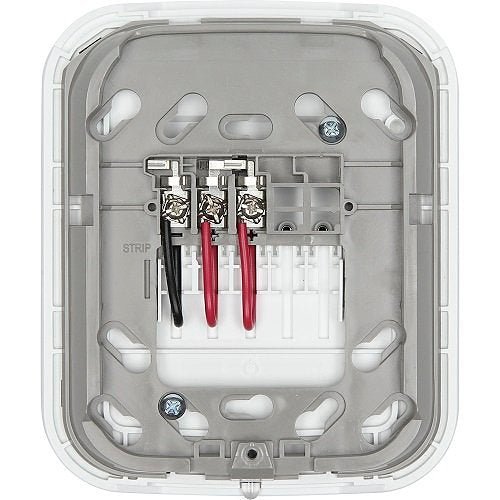 System Sensor ULC WAV-WL fire alarm with wireless communication, mounted on wall, in a commercial safety setting.