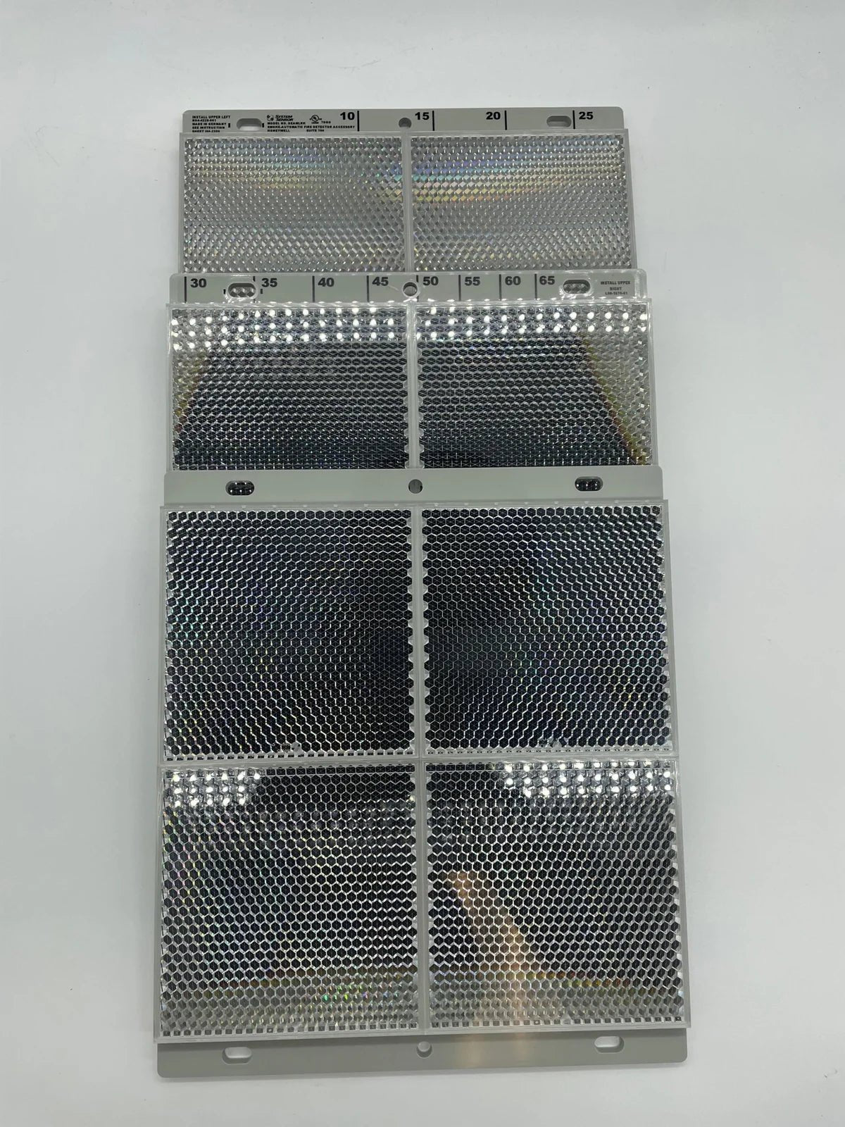 System Sensor BEAMLRK ULC laser beam detector with mounting hardware and wiring components for fire alarm systems.
