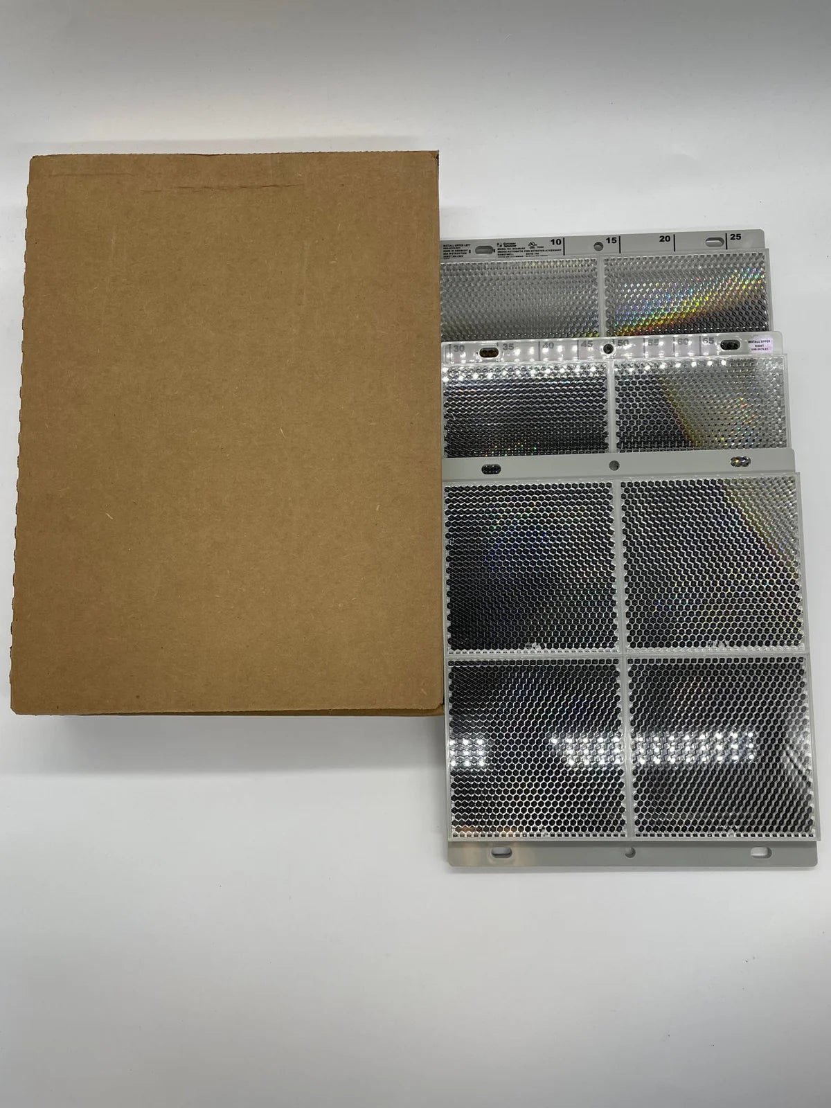 System Sensor BEAMLRK ULC beam sensor with mounting hardware, designed for intrusion detection in security systems.