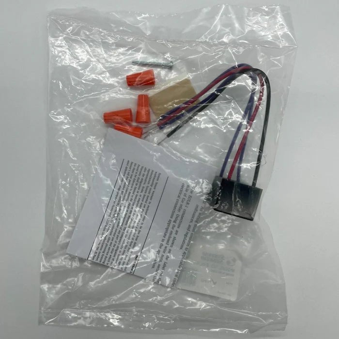 System Sensor EOLR-1 smoke detector with alarm and sensors, mounted on a ceiling for fire detection.