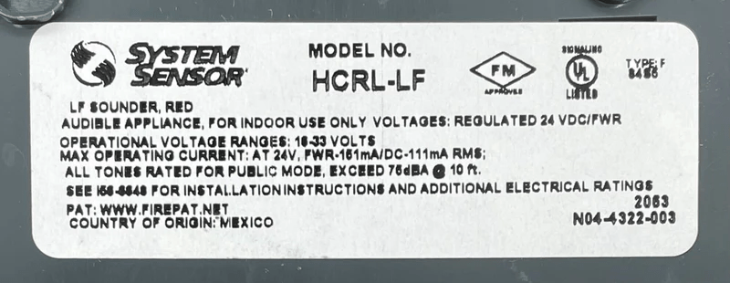 System Sensor HCRL-LF fire alarm relay module with wiring terminals and LED indicator on a white background.